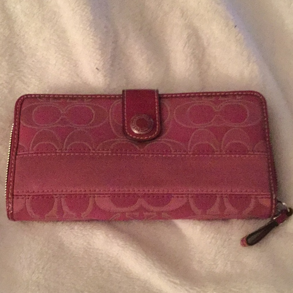 NWOT Coach wallet in a raspberry color.